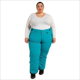 Woman wearing teal insulated ski pants from Snow Country Outerwear for plus size snow skiing