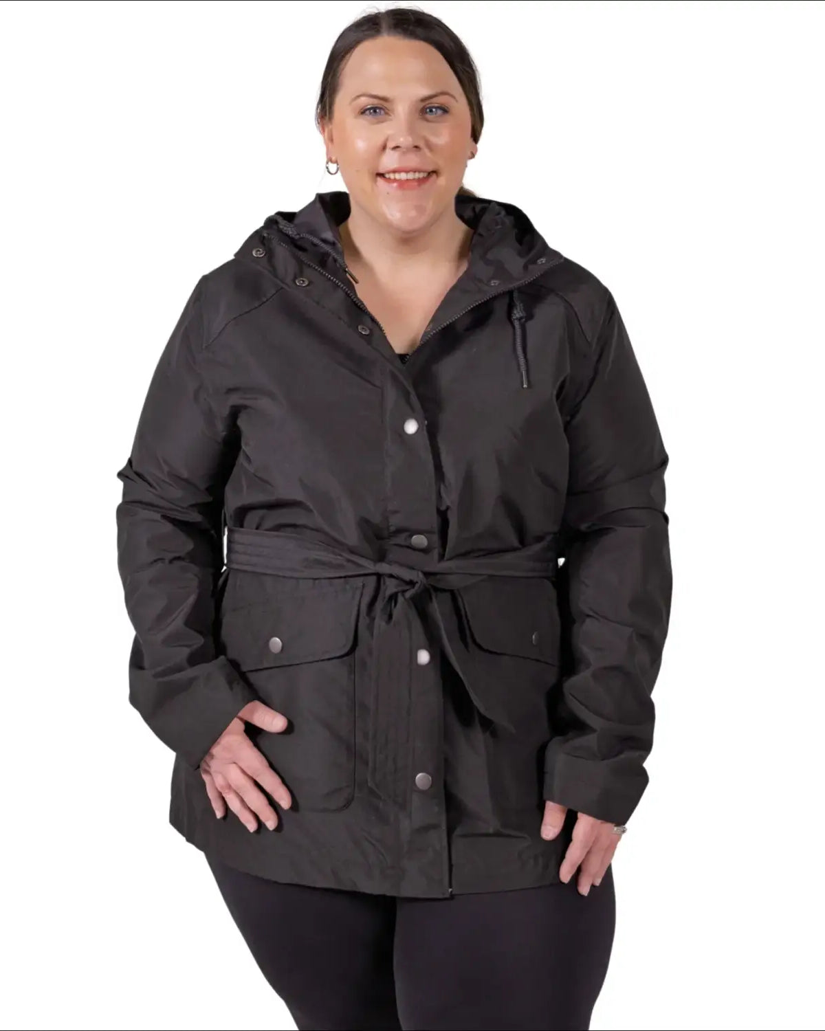 Woman wearing black belted hooded rain jacket from Snow Country Outerwear Plus Size collection