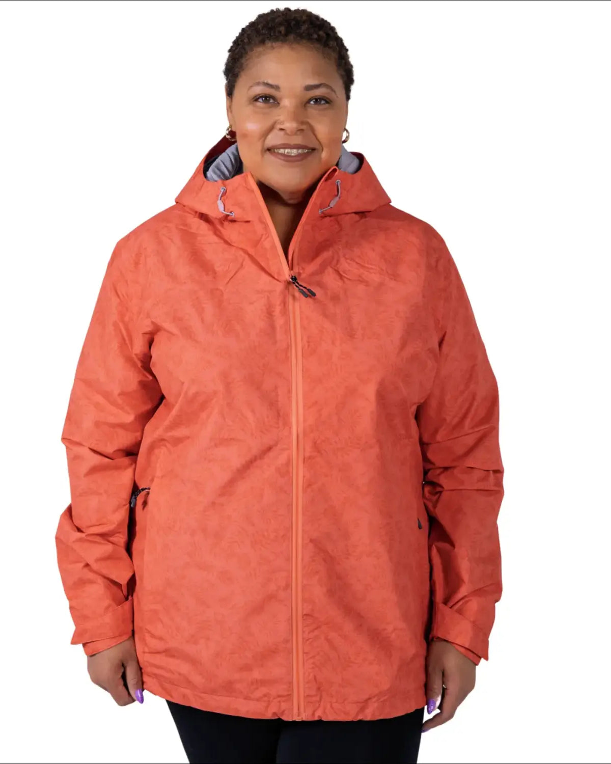 Woman wearing an orange hooded rain jacket from 1X-2X Women’s Plus Size Waterproof Windbreaker