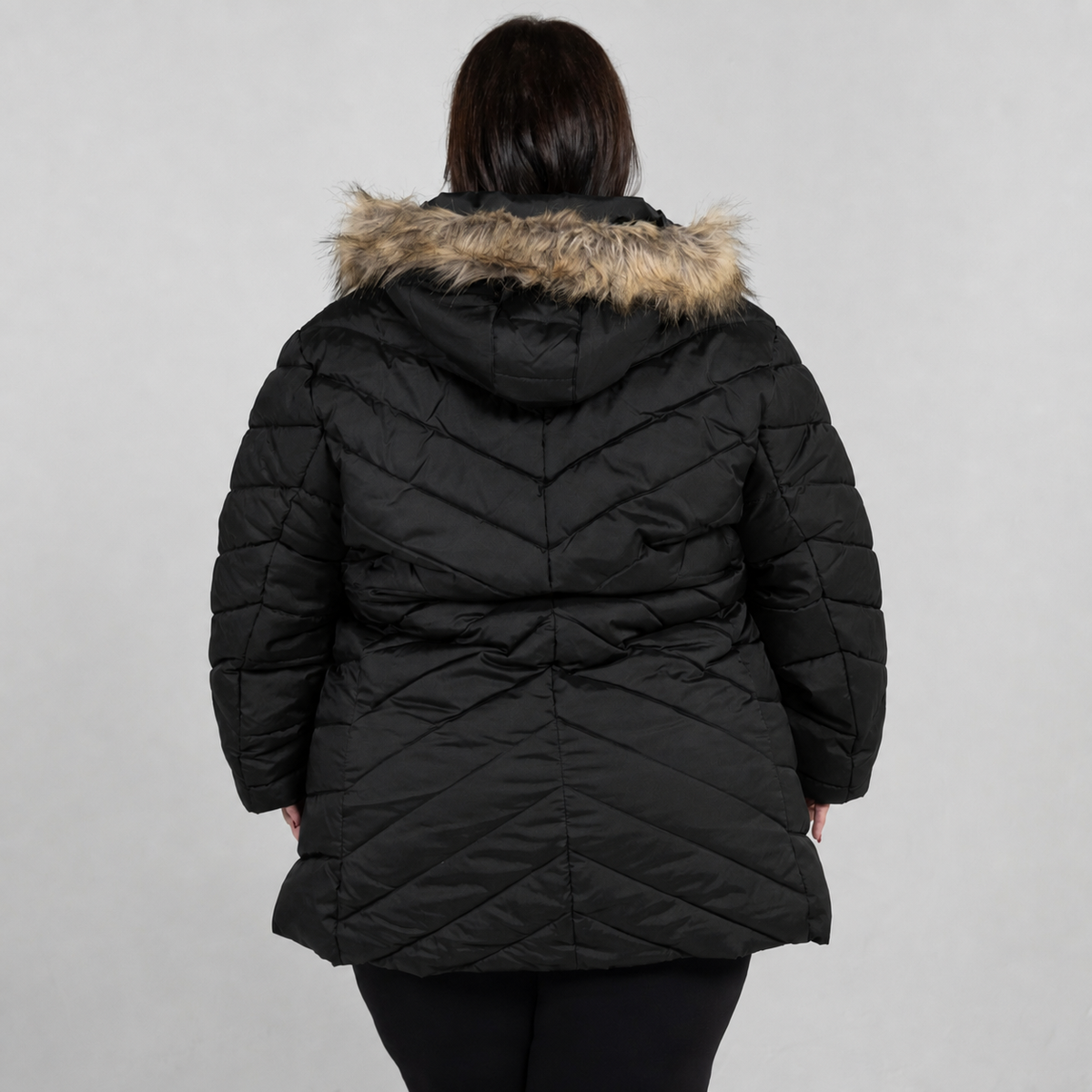 Black Axtell plus size parka, sizes 1X to 6X, back view on model