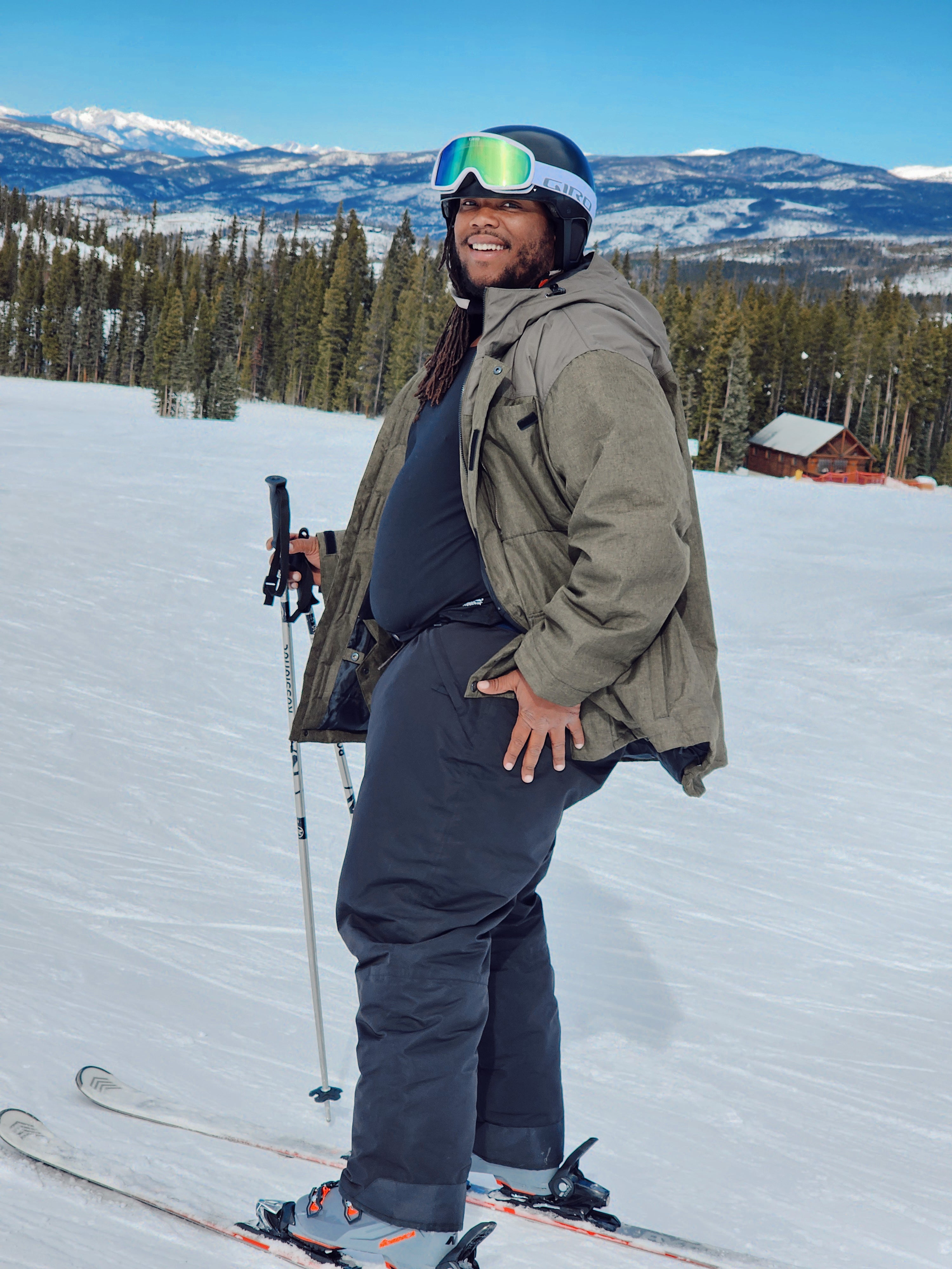 Big and tall ski jacket and big and tall snow pants on a man