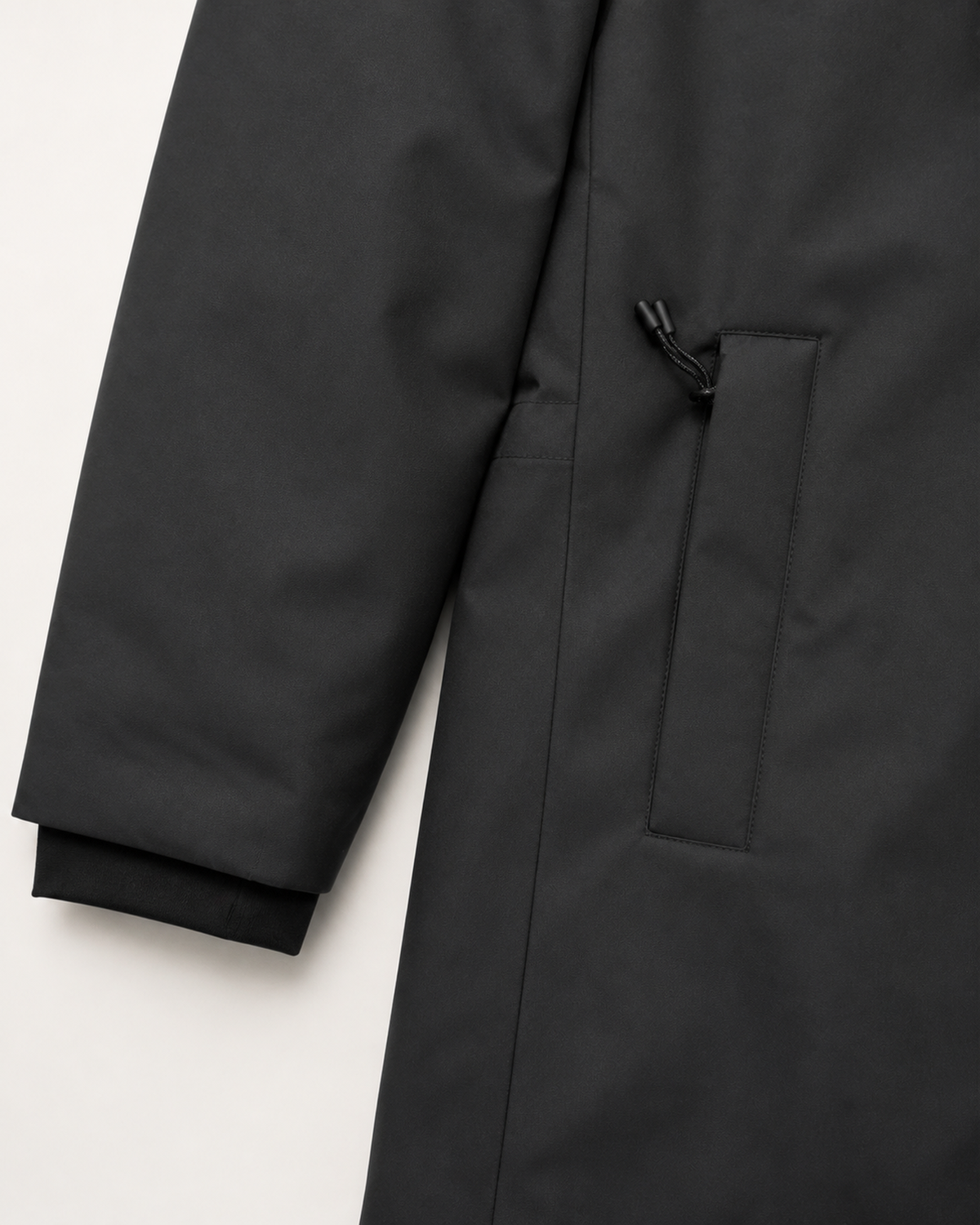 Black Cortina women's plus size insulated parka, flat lay, pocket