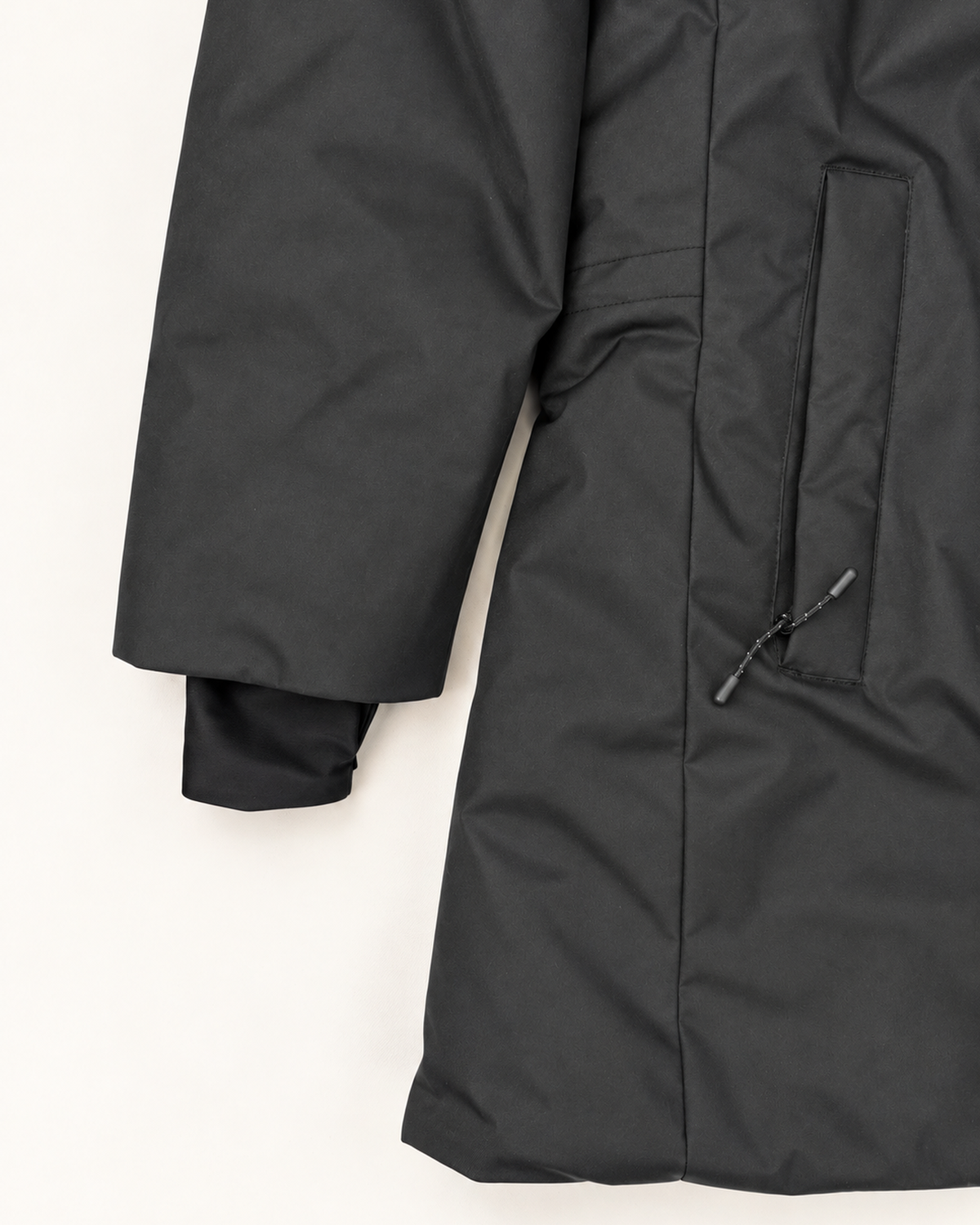 Black Cortina women's plus size insulated parka, flat lay, pocket