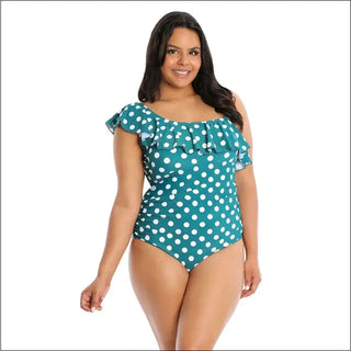 Green polka dot one-piece swimsuit with ruffle detail for plus size women