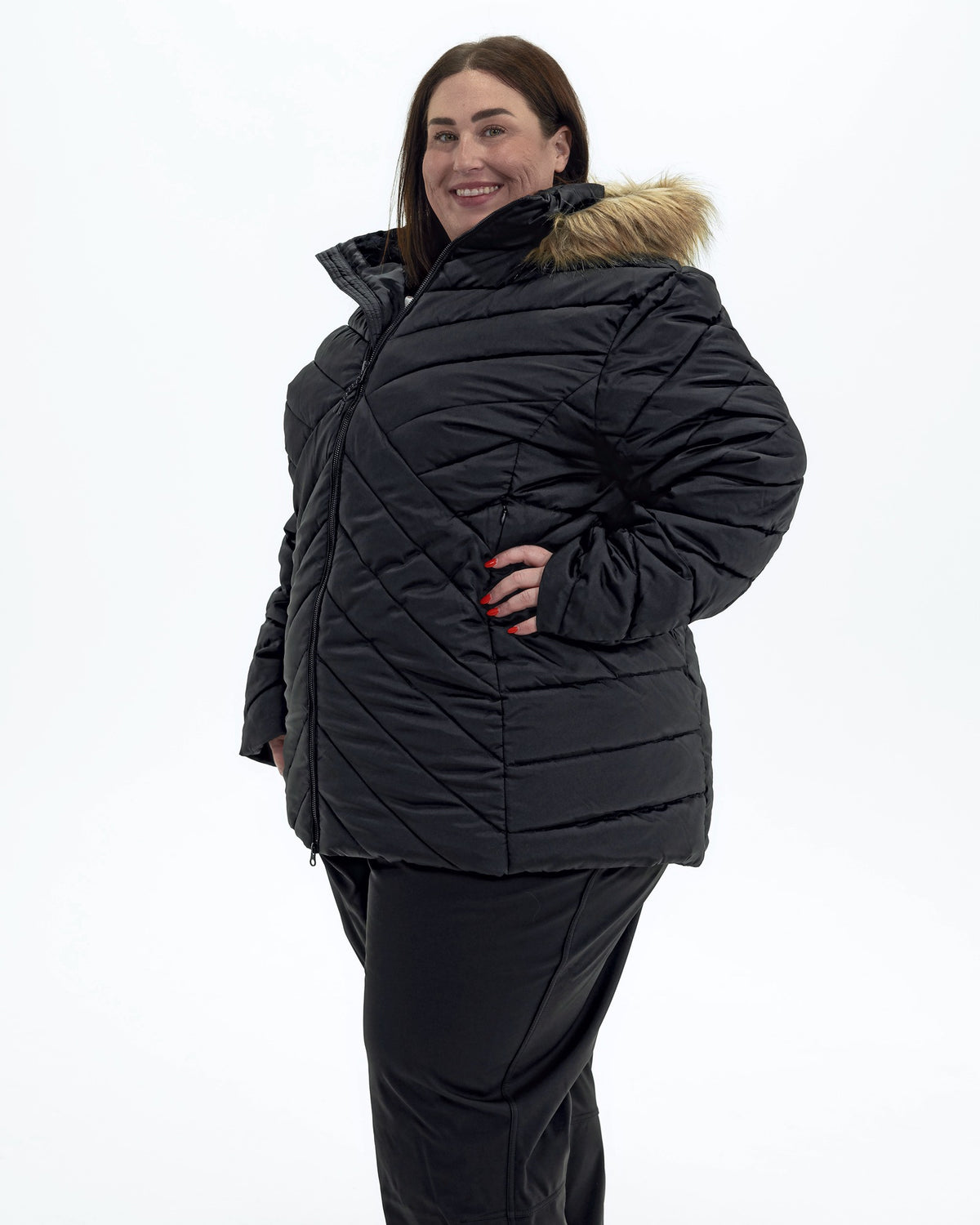 Black The Axtell plus size hooded winter parka, three quarter view | Model is 5'4" and wears a 3X