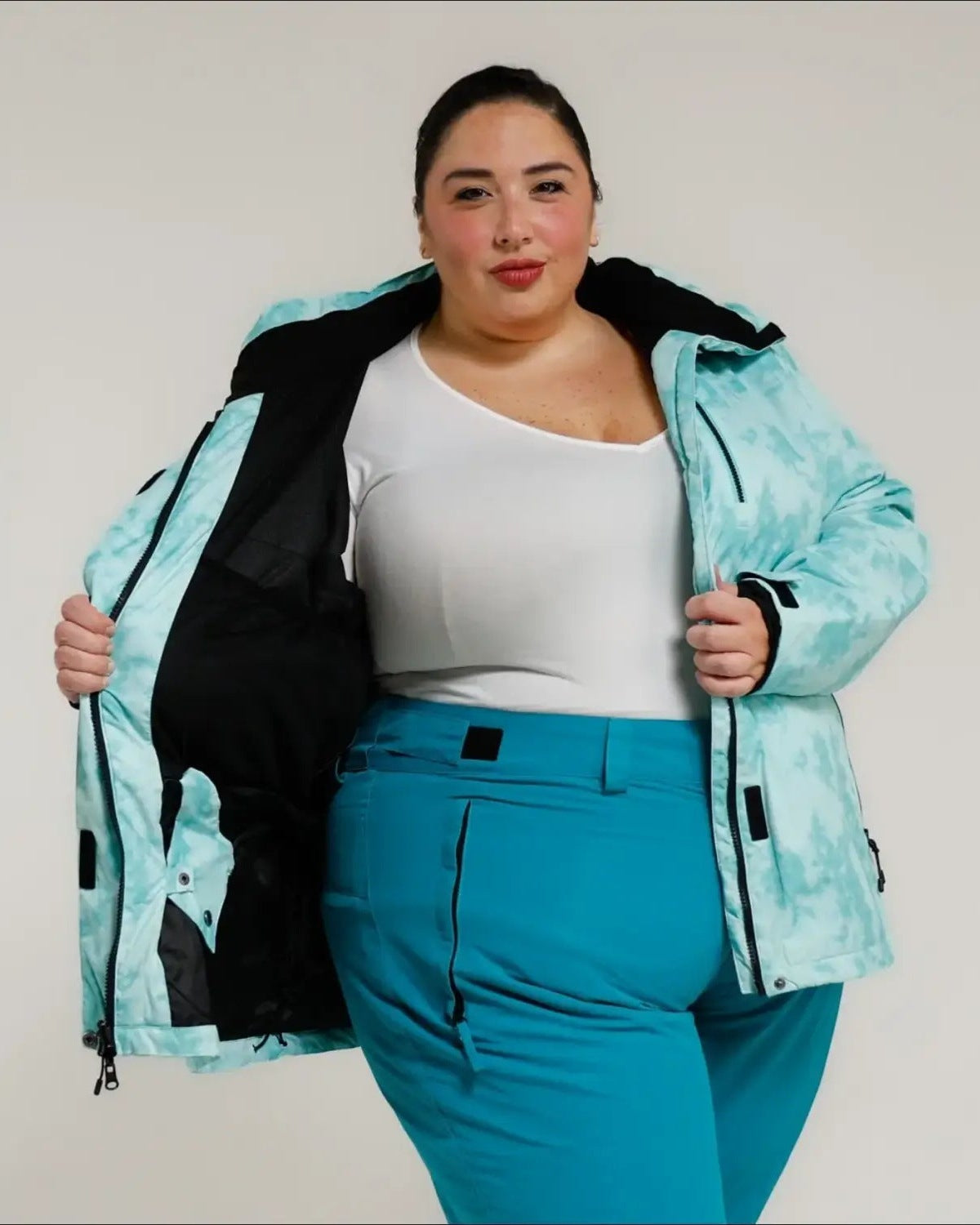 Mint Marble Bevel plus size insulated winter jacket, worn open showing the lining
