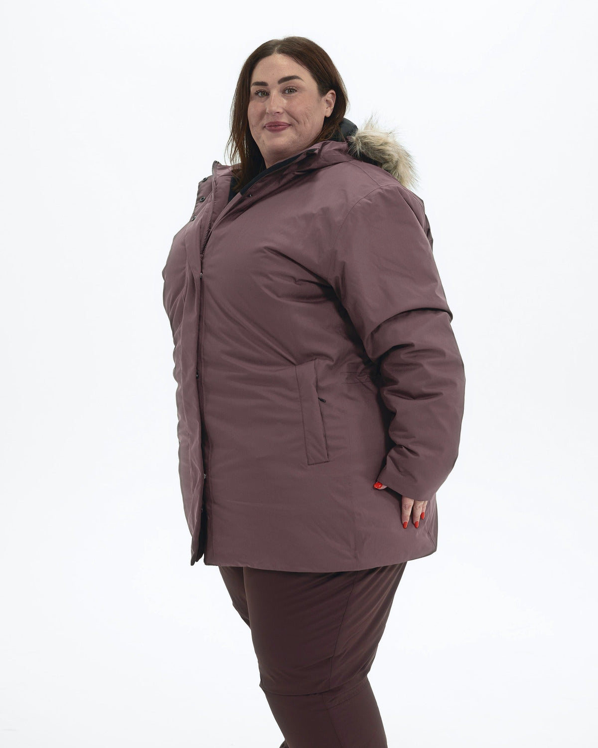 Eggplant Cortina women's plus size insulated parka, three quarter view | Model is 5'4" and wears a 3X