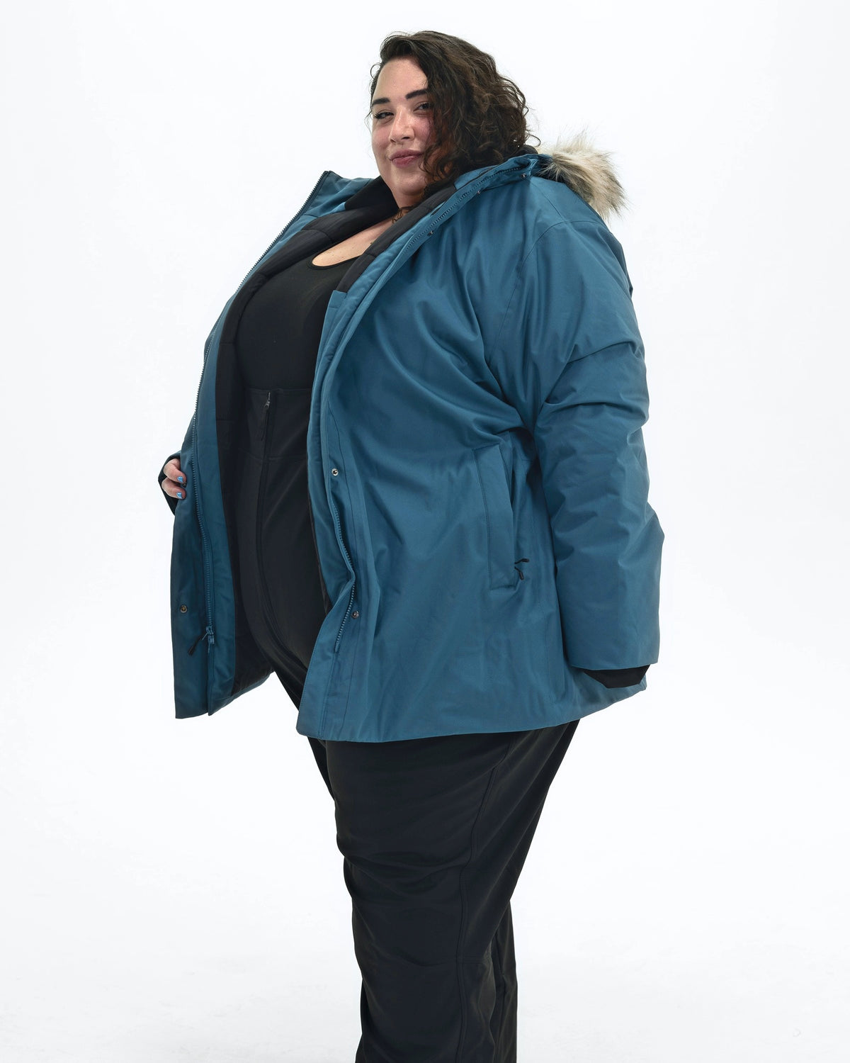 Peacock Cortina women's plus size insulated parka, side | Model is 5'4" and wears a 5X