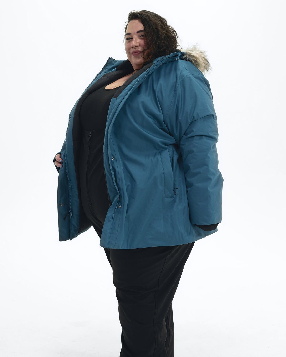 Peacock Cortina women's plus size insulated parka, side | Model is 5'4" and wears a 5X