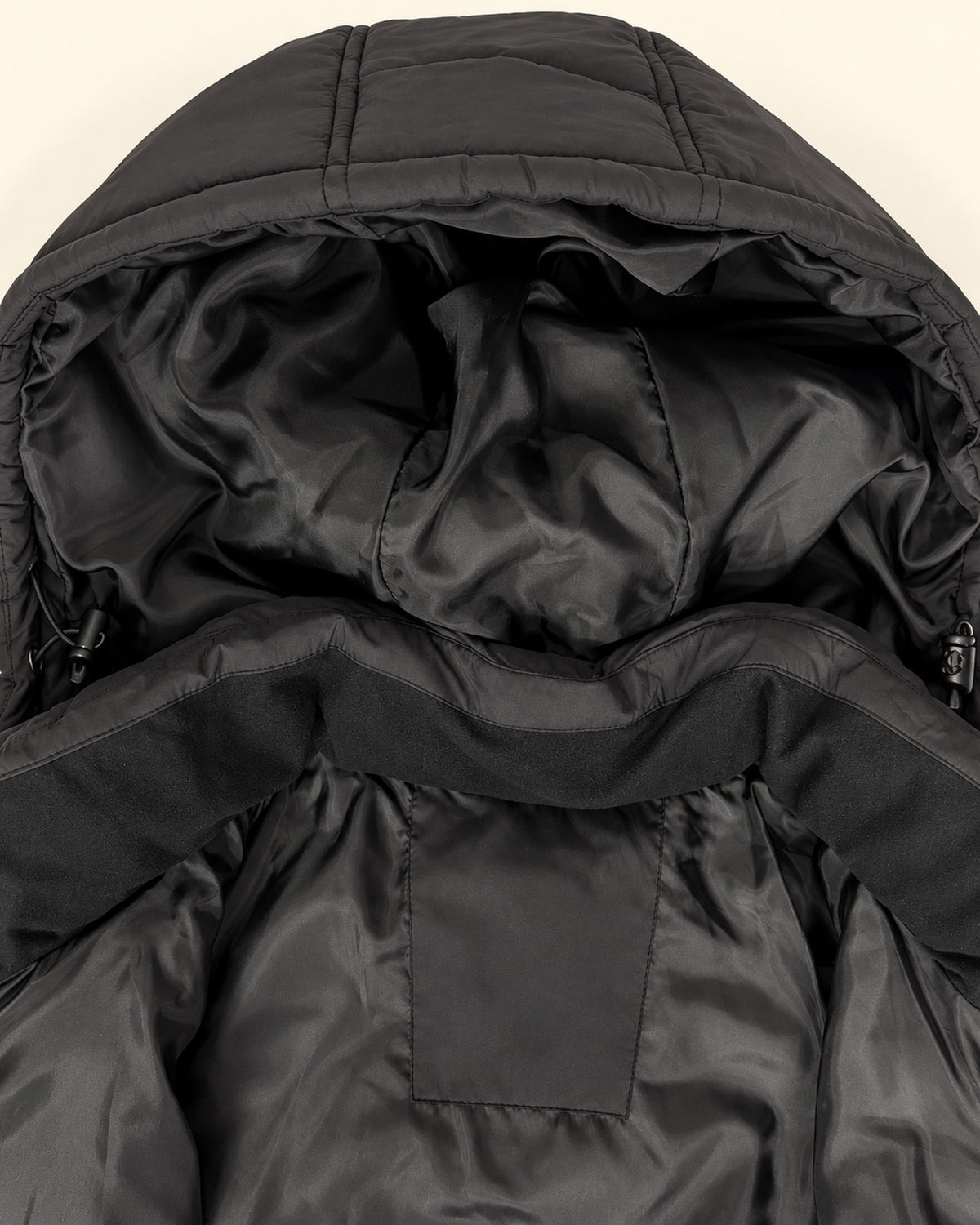 Black The Geneva plus size mid length synthetic down jacket, sizes 1X to 6X, flat lay hood and collar detail