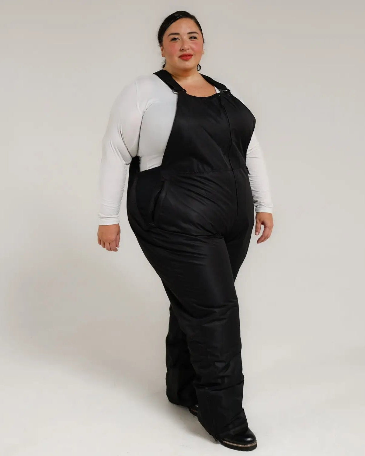 Black women's plus size Overland snow bibs, three quarter