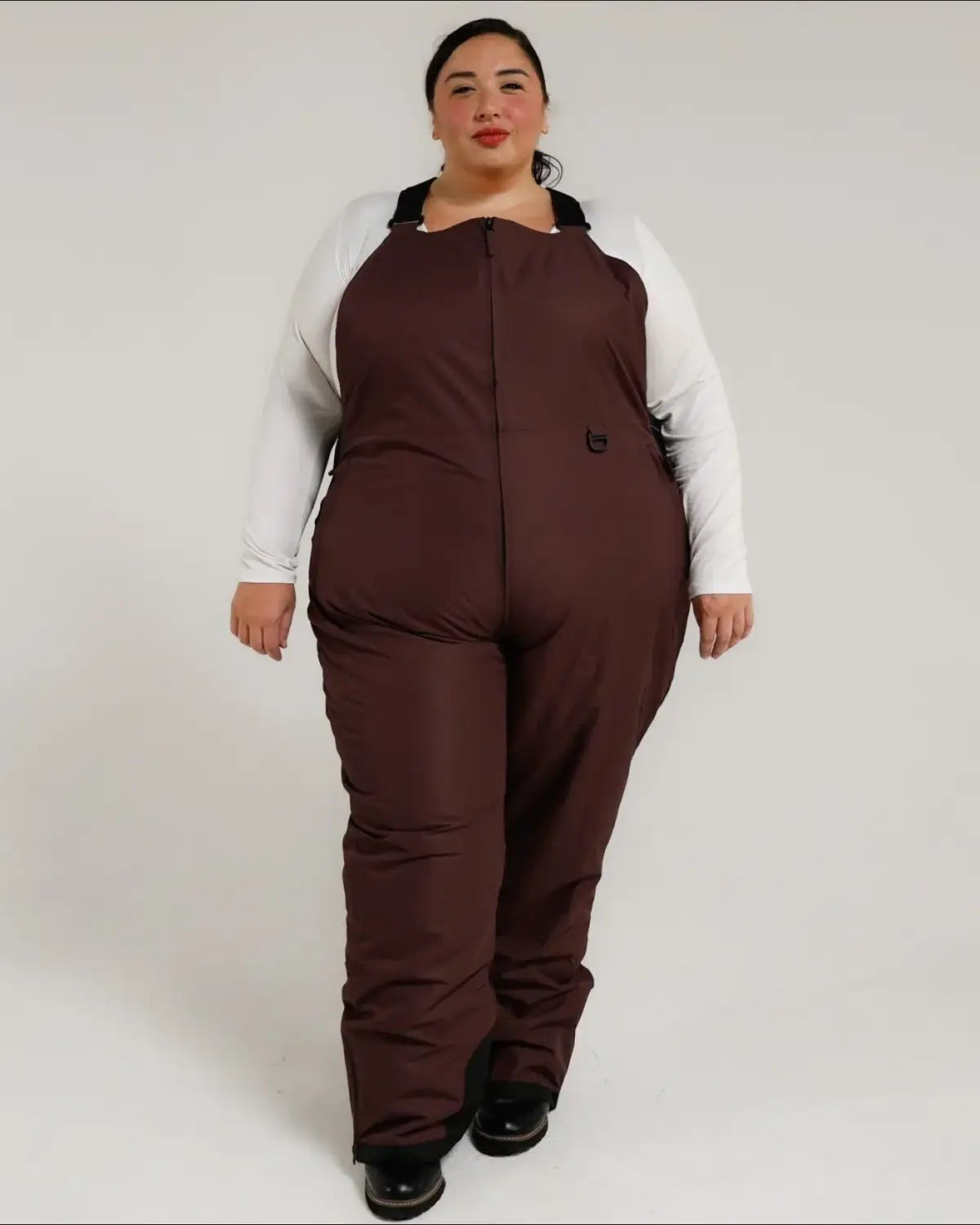 Black Cherry women's plus size Overland snow bibs, front walking