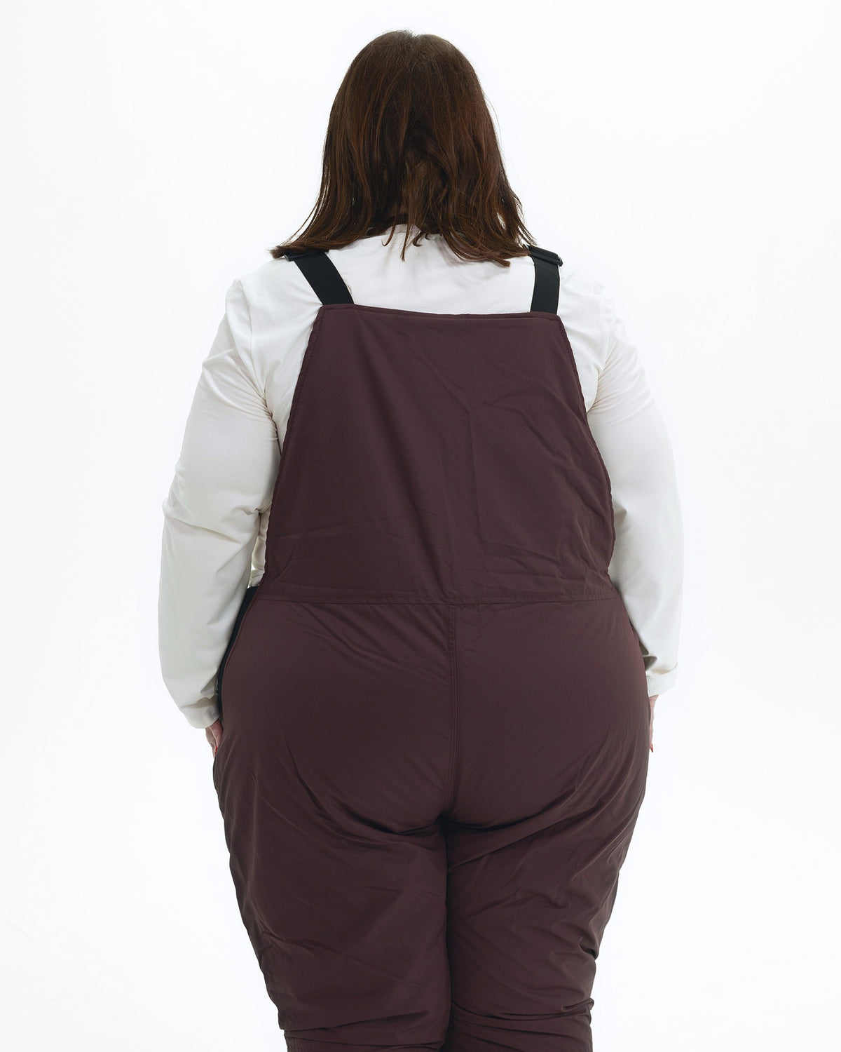 Eggplant women's plus size Overland snow bibs, back | Model is 5'4" and wears a 3X