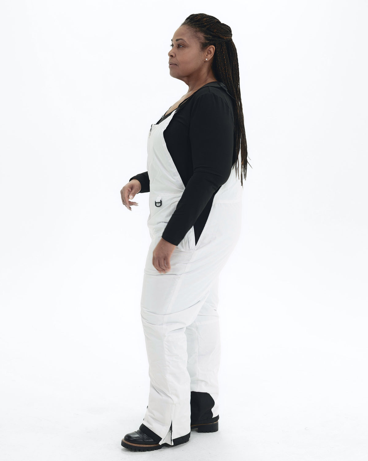 White women's plus size Overland snow bibs, side | Model is 5'6" and wears a 1X