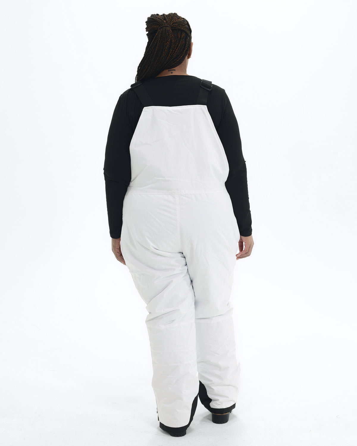 White women's plus size Overland snow bibs, back | Model is 5'6" and wears a 1X