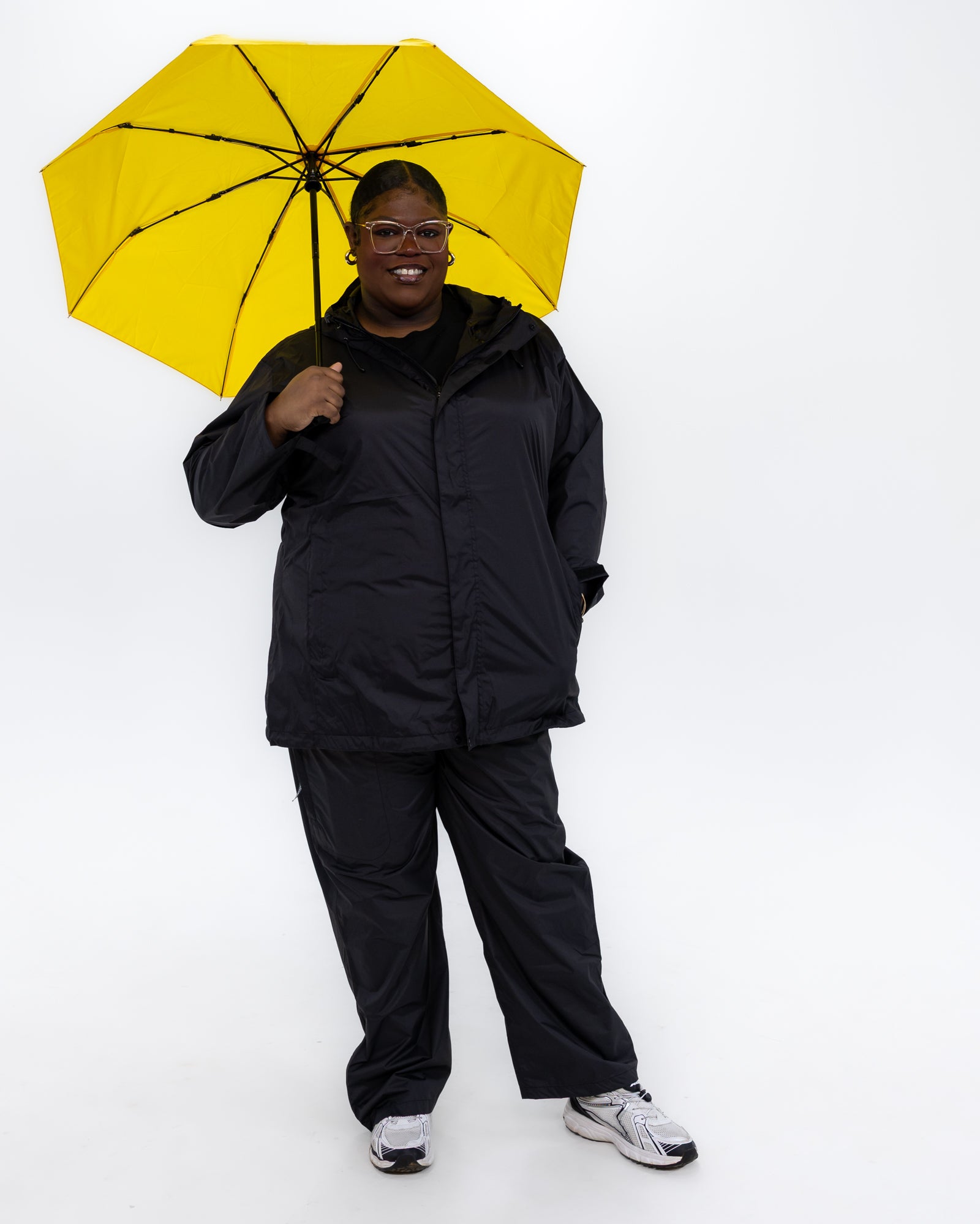 Plus size pod rain jacket black 7 | Model is 5'9" and wears a 3X