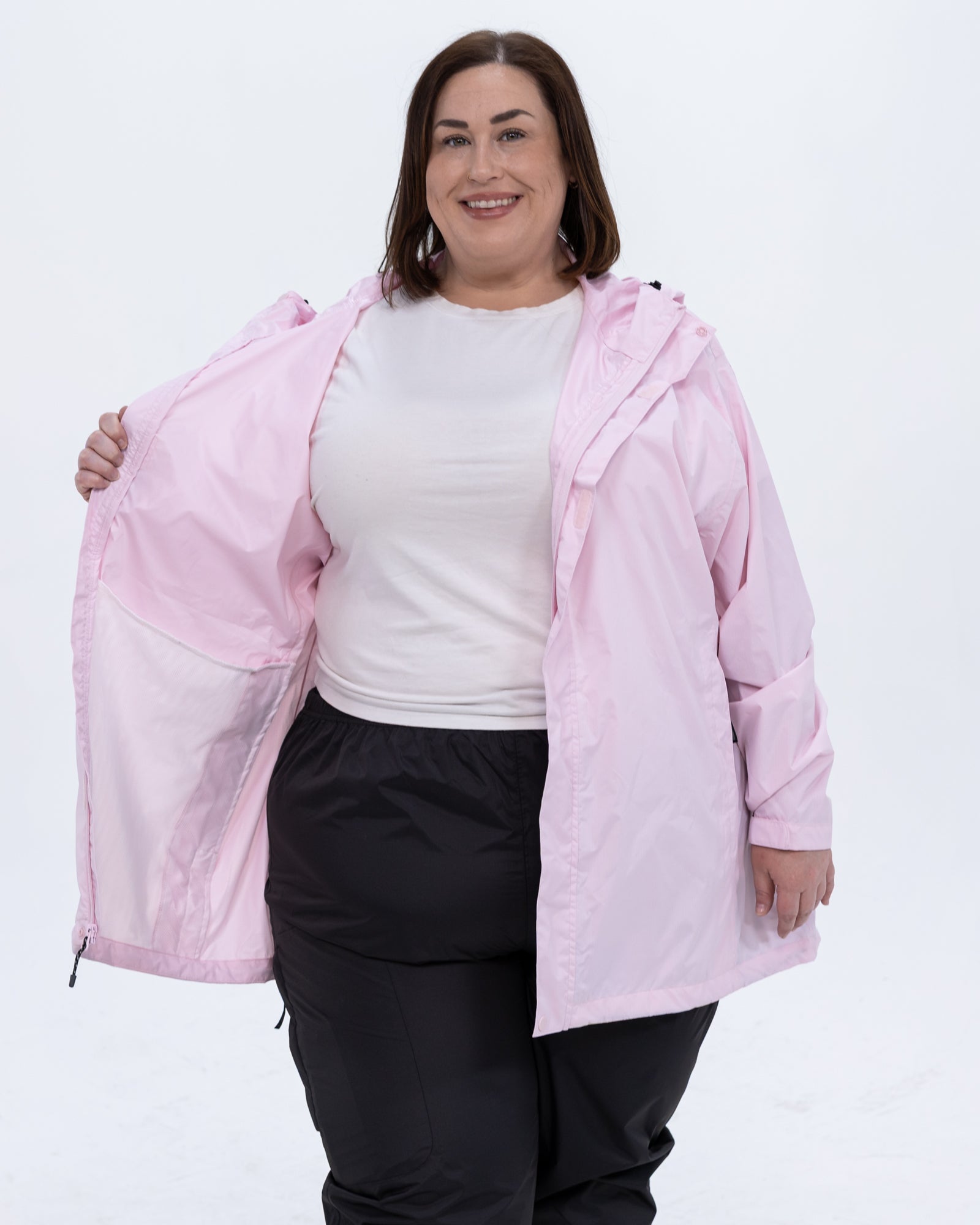 Plus size pod rain jacket pink 2 | Model is 5'4" and wears a 3X