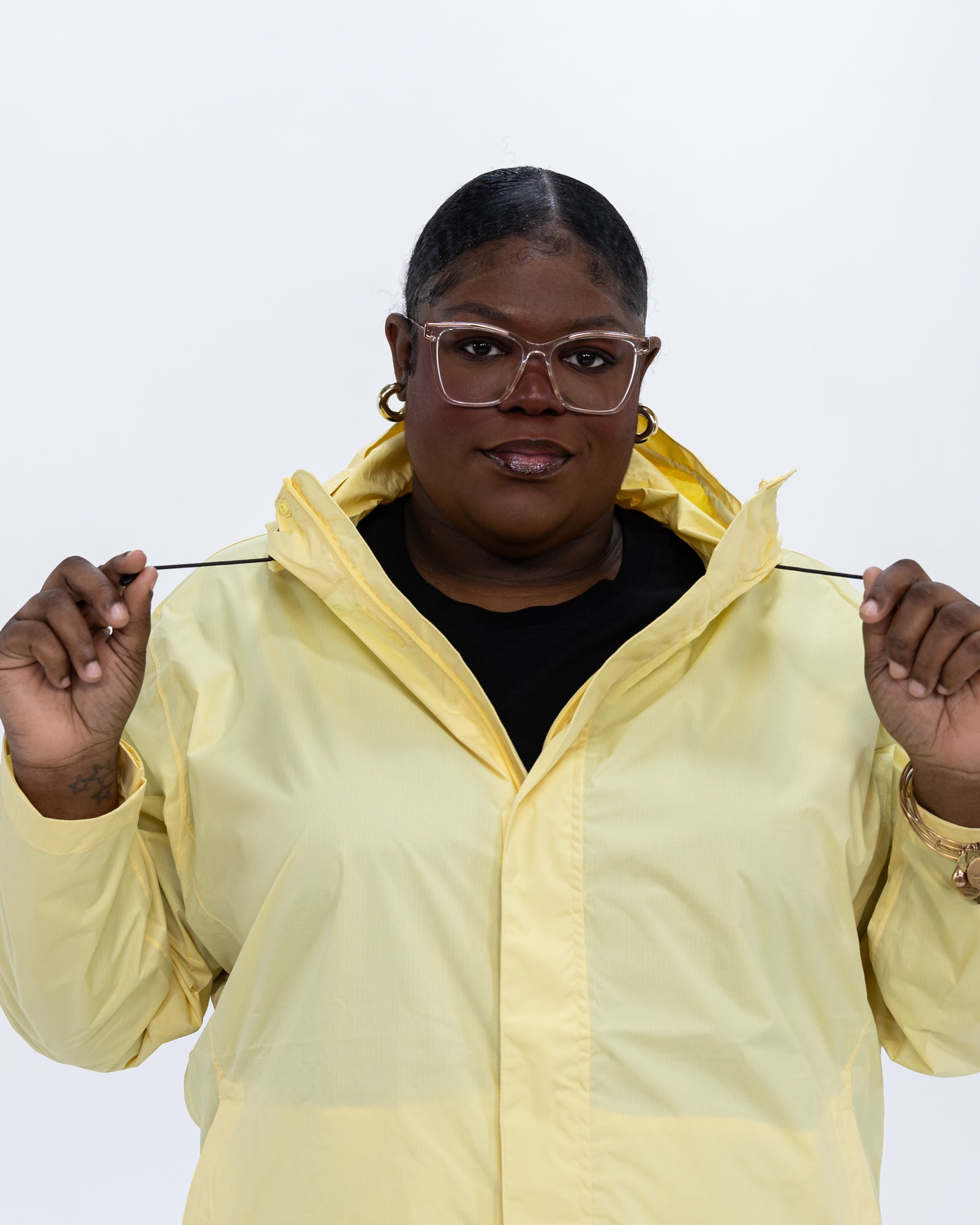 Plus size pod rain jacket yellow 5 | Model is 5'9" and wears a 3X