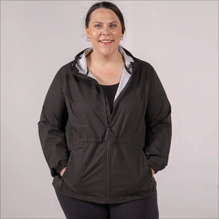 Plus size woman wearing a black hooded rain jacket and wind breaker for women