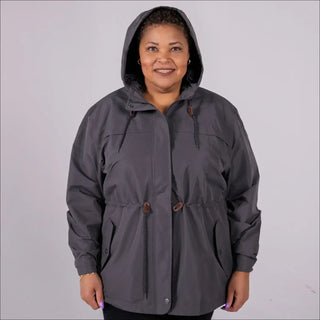 Gray plus size rain jacket on model, front image with hood up