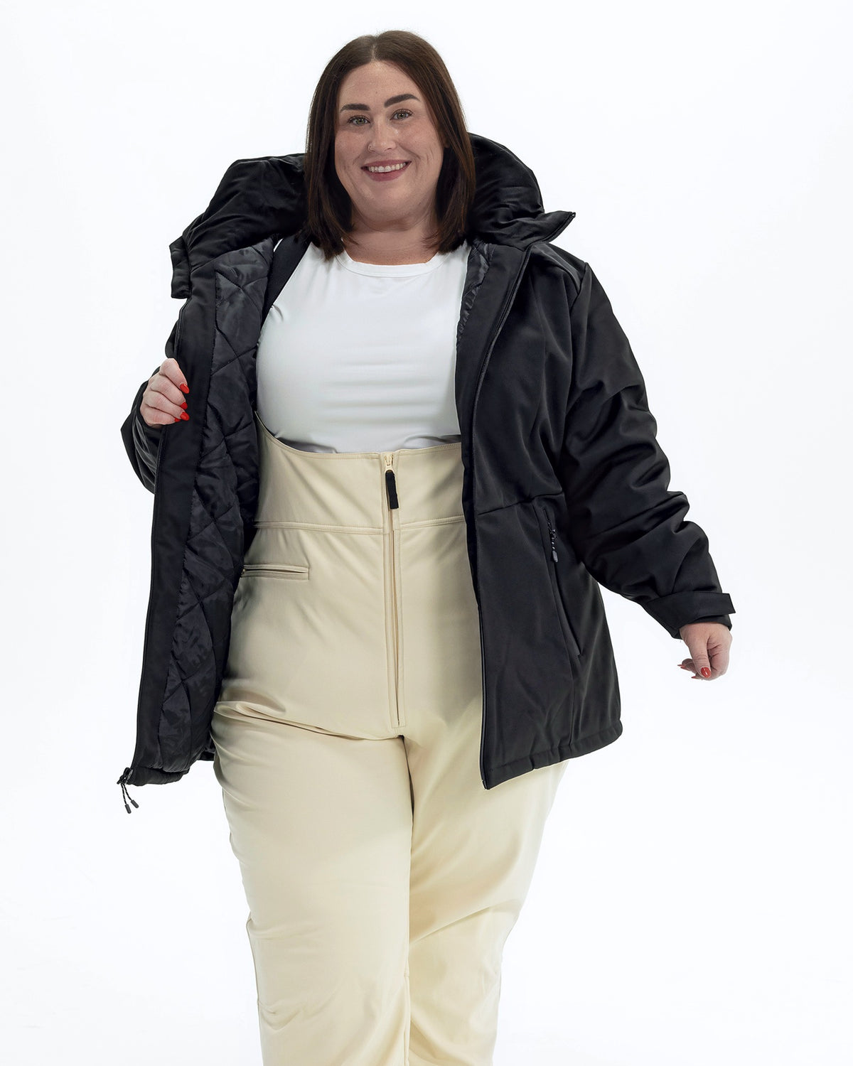 Black The Siberian plus size heavy insulated softshell coat, worn open showing the quilted lining | Model is 5'4" and wears a 3X
