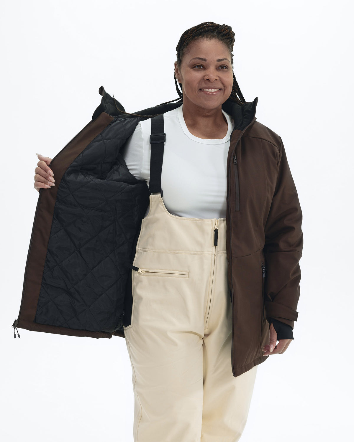 Chocolate The Siberian plus size heavy insulated softshell coat, worn open showing the quilted lining | Model is 5'6" and wears a 1X