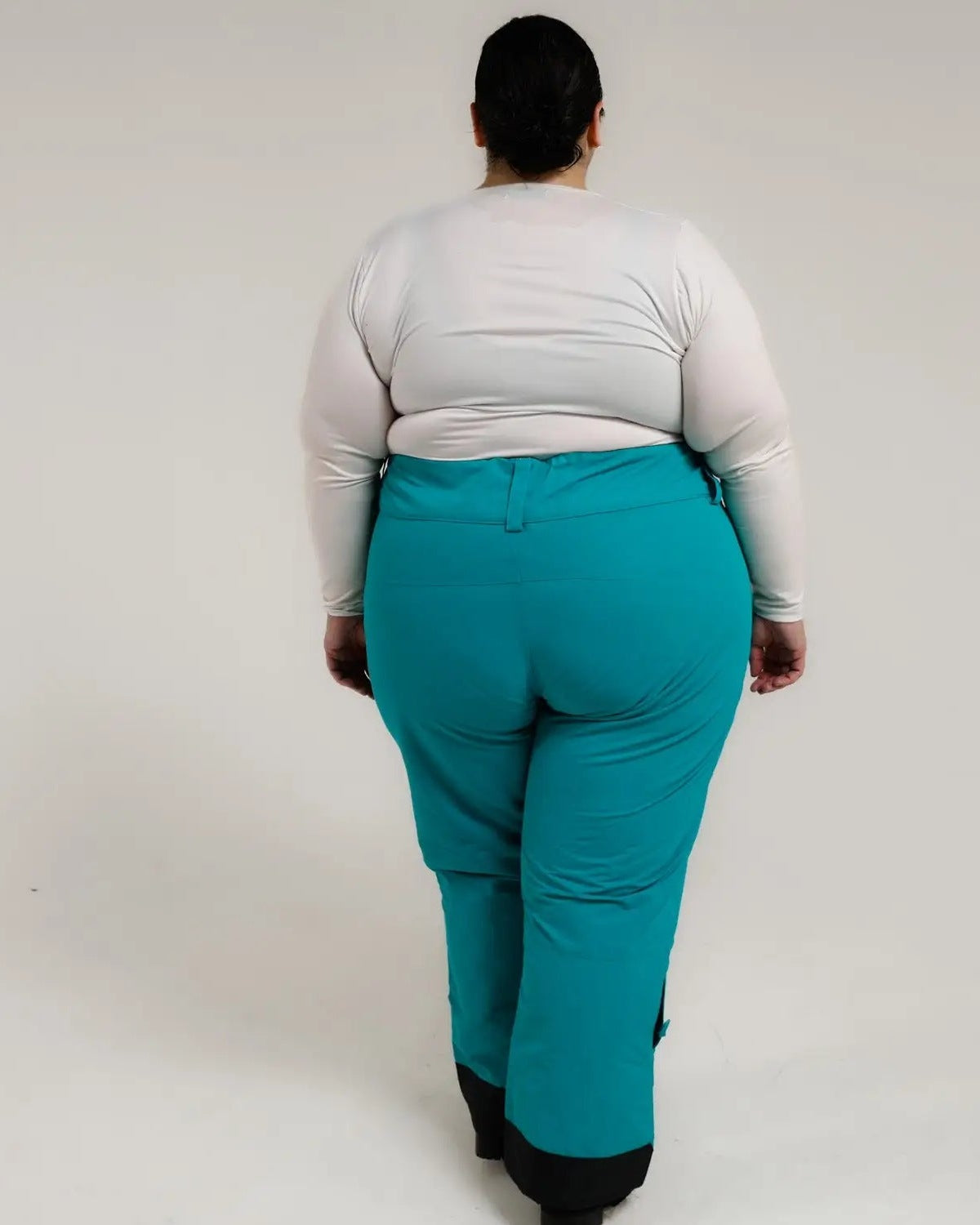 Teal snow pants from Snow Country Outerwear for women with plus sizes and insulated design