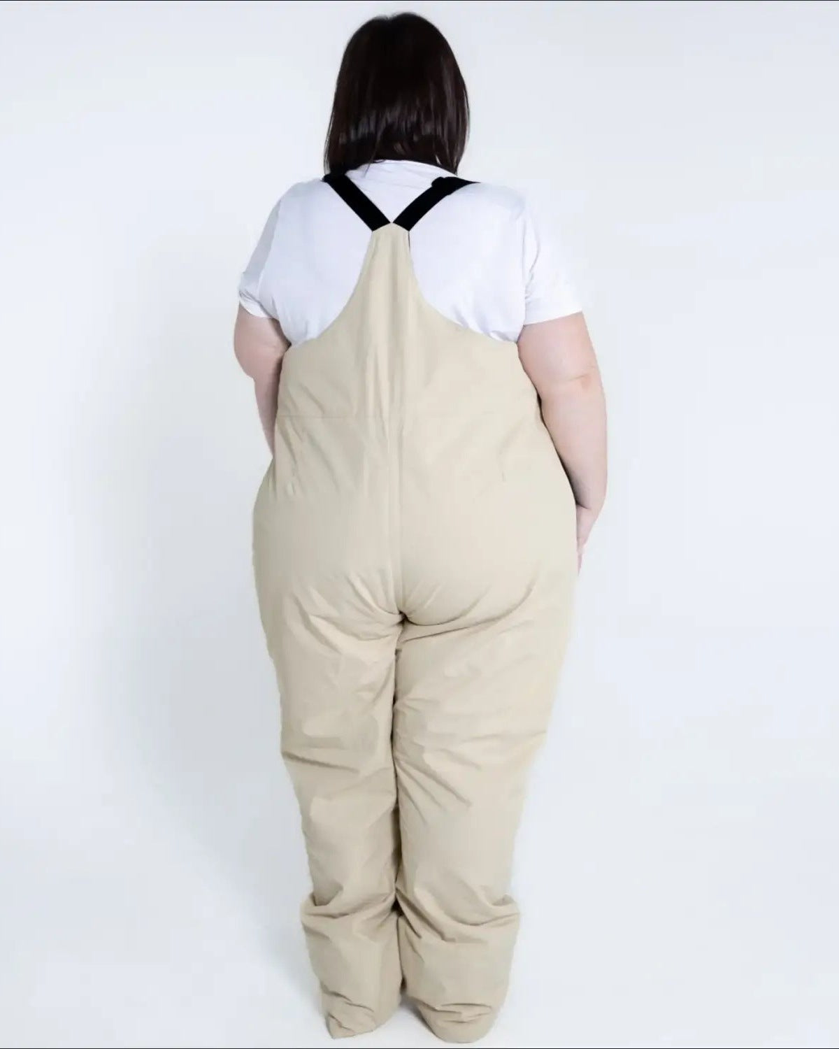 Beige plus-size snow bib overalls from Snow Country Outerwear Women’s Vertex collection