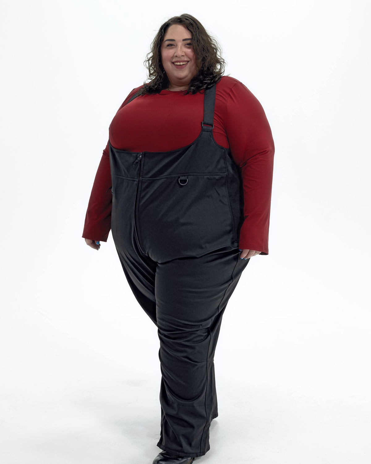 Black women's plus size soft shell snow bibs, three quarter view | Model is 5'4" and wears a 5X