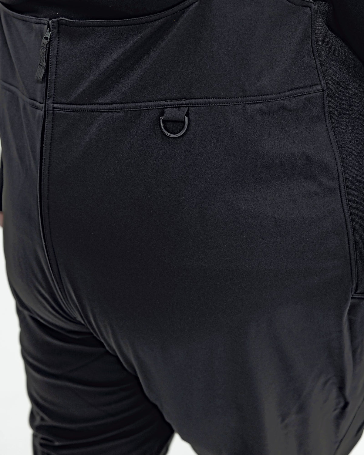 Black women's plus size soft shell snow bibs, chest D-ring detail