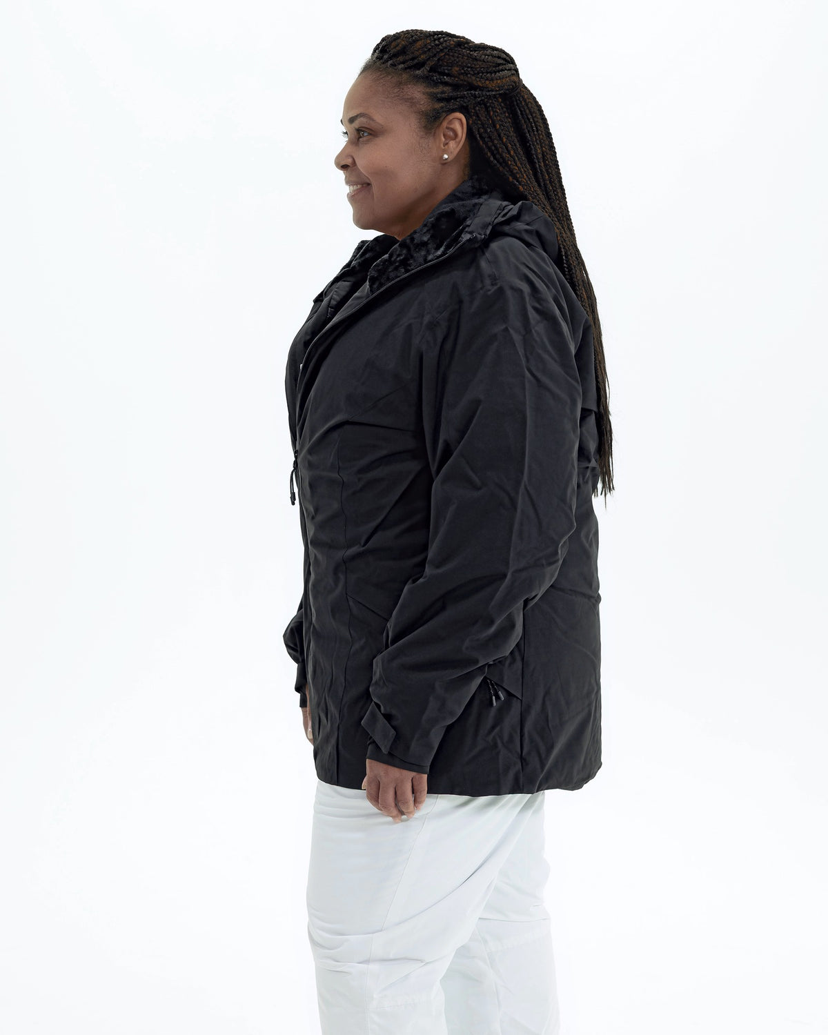 Black Tempest women's plus size insulated snow jacket, side | Model is 5'6" and wears a 1X
