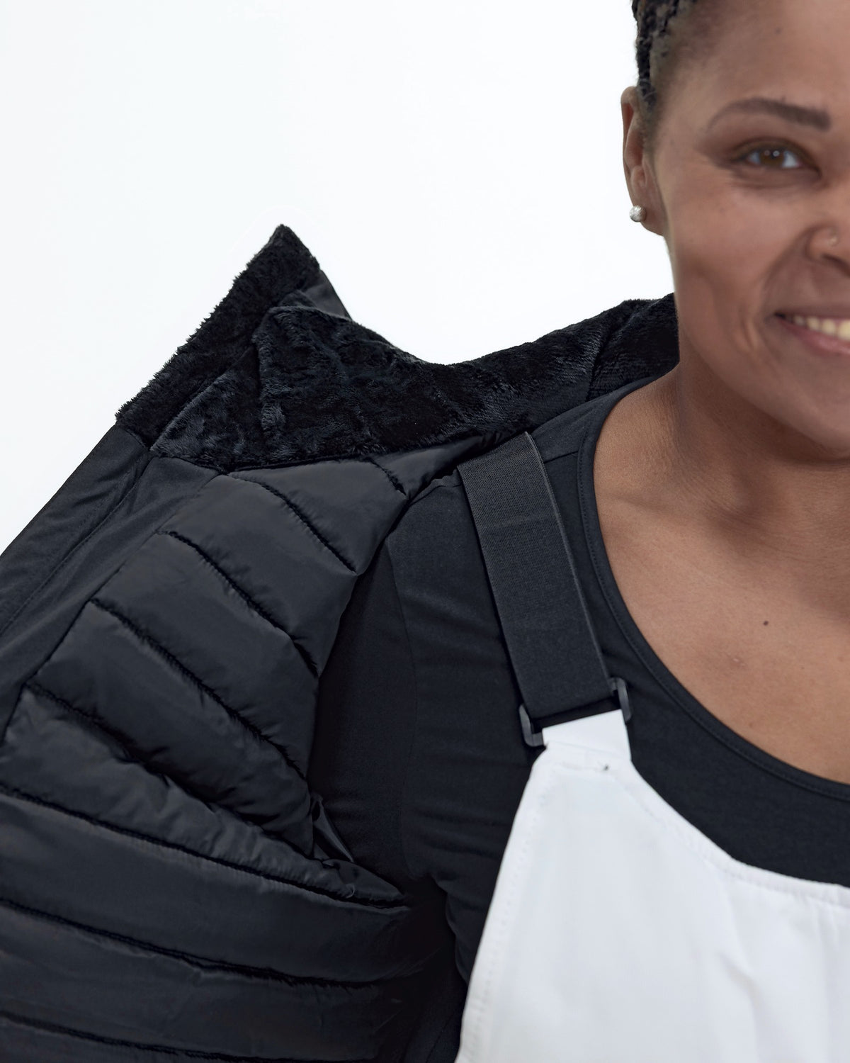 Black The Tempest plus size insulated snow jacket, collar and snowskirt detail