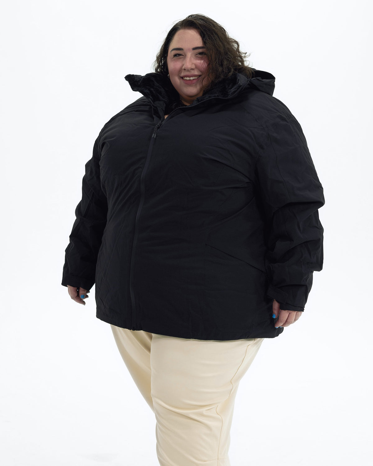 Black The Tempest plus size insulated snow jacket, front | Model is 5'4" and wears a 5X