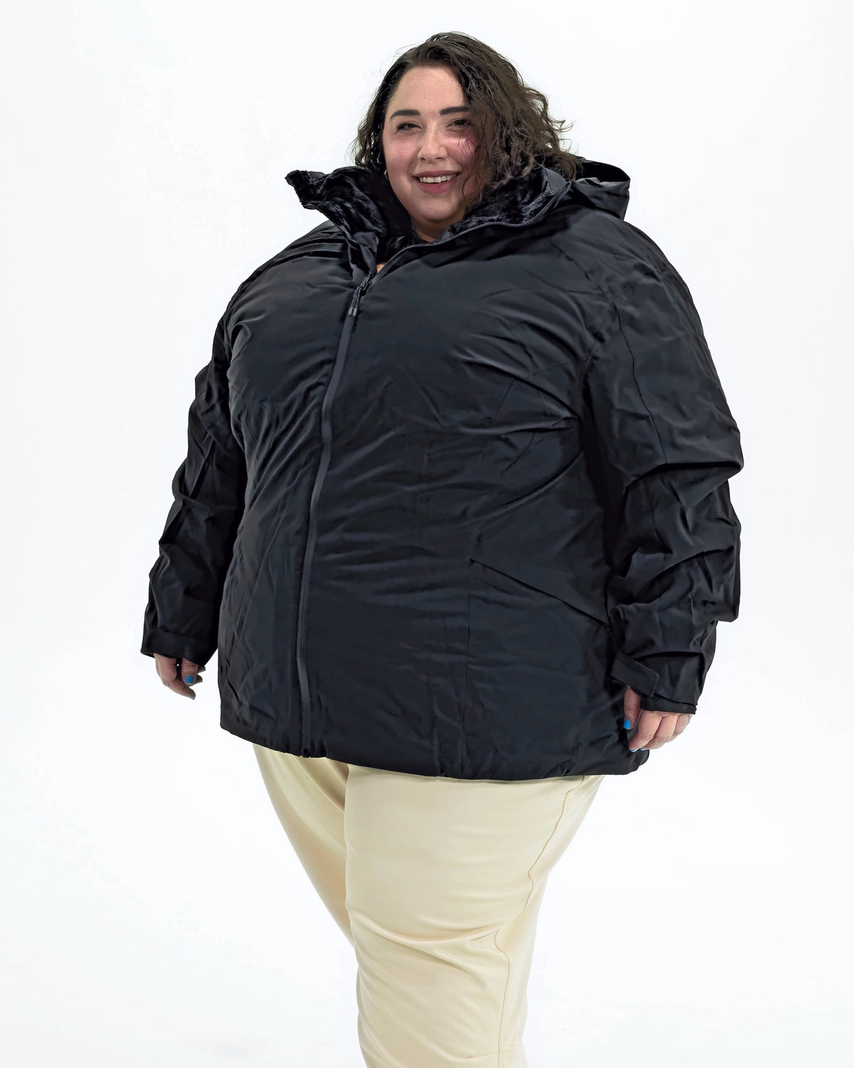 Black Tempest women's plus size insulated snow jacket, front | Model is 5'4" and wears a 5X