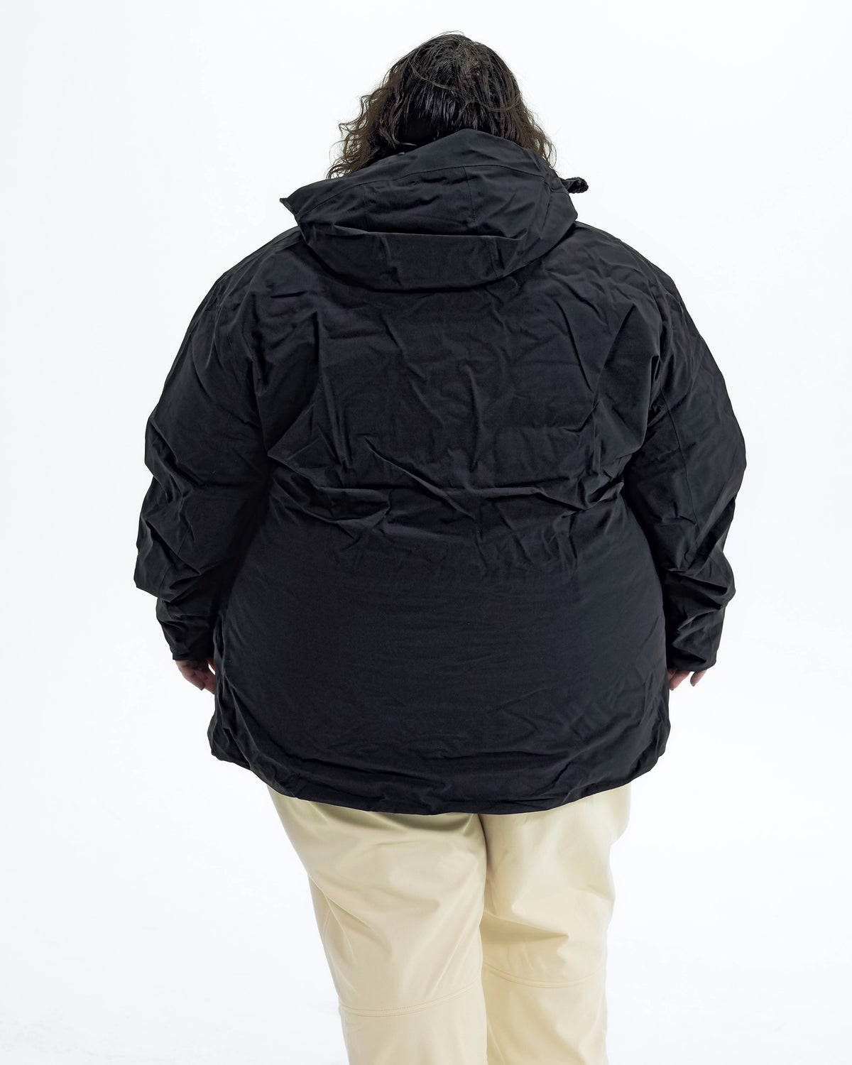 Black The Tempest plus size insulated snow jacket, back | Model is 5'4" and wears a 5X