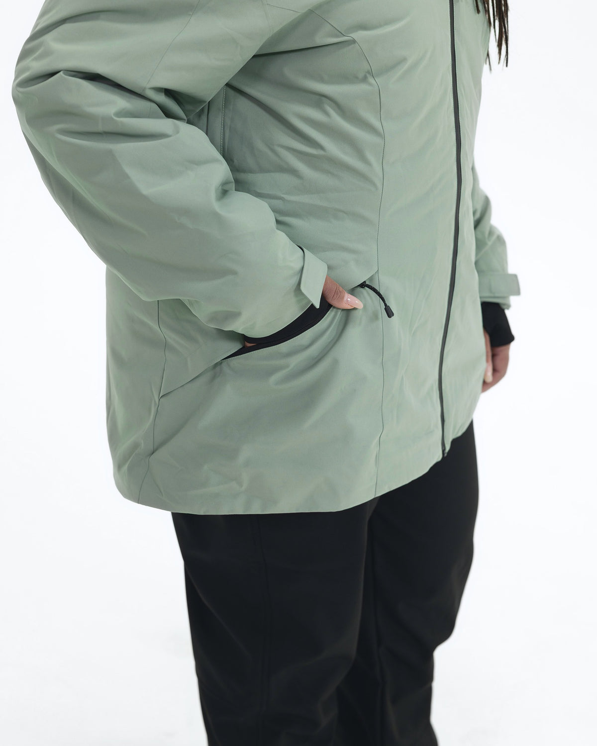 Green Lily The Tempest plus size insulated snow jacket, zippered hand pocket detail