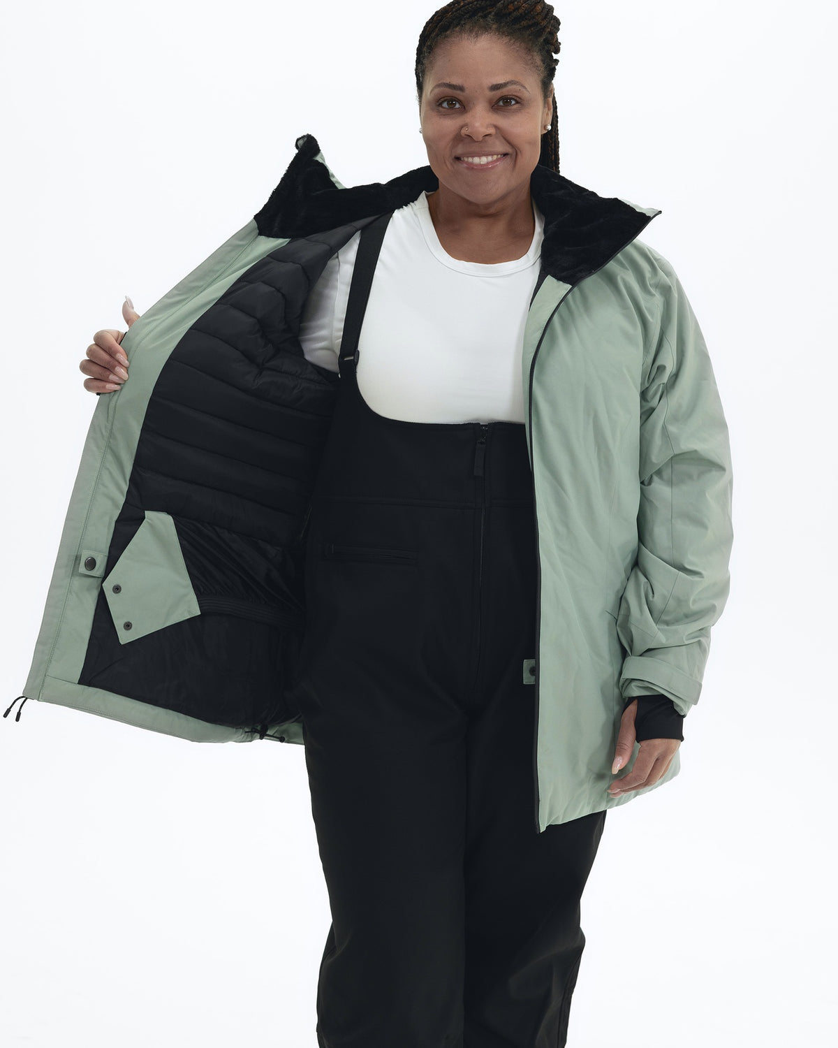 Green Lily The Tempest plus size insulated snow jacket, worn open showing the insulated lining | Model is 5'6" and wears a 1X