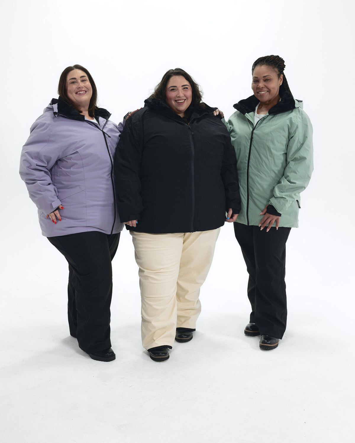 The Tempest plus size insulated snow jacket, sizes 1X to 6X, worn by three models