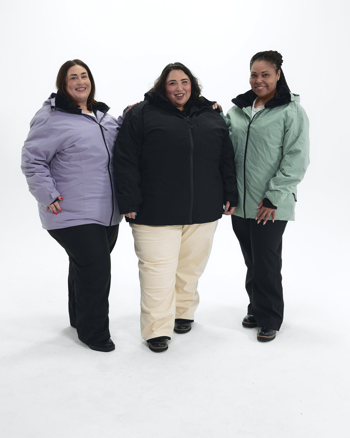 The Tempest plus size insulated snow jacket, sizes 1X to 6X, worn by three models