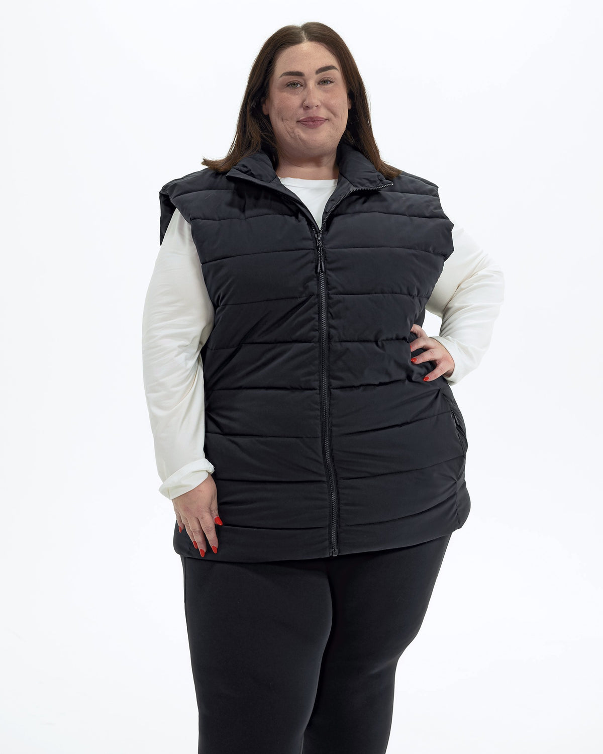 Black Tempo II women's plus size insulated vest, three quarter view | Model is 5'4" and wears a 3X