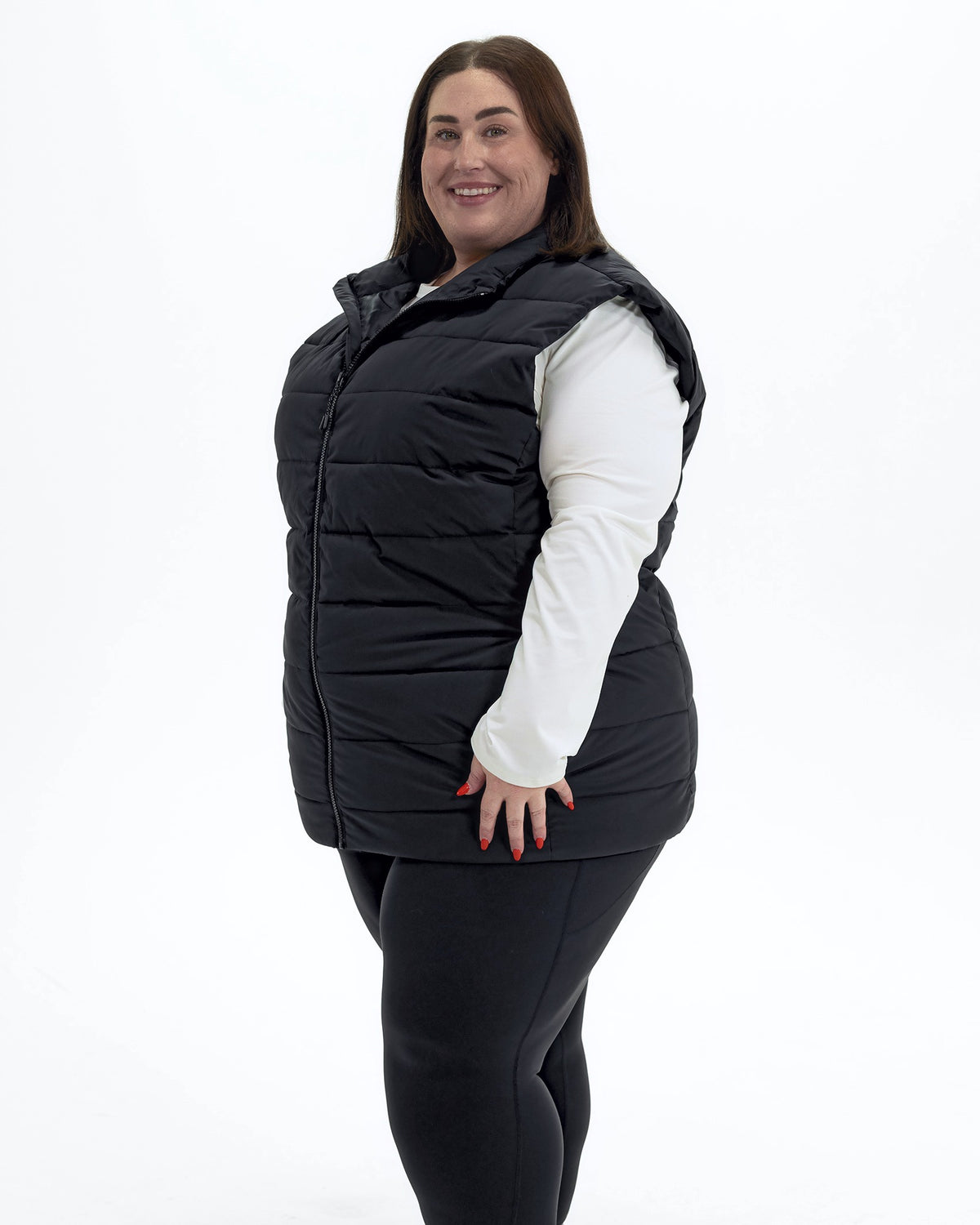 Black Tempo II women's plus size insulated vest, three quarter view | Model is 5'4" and wears a 3X