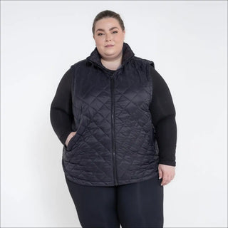 Plus size insulated black quilted vest for women showcased in Savvy Outerwear collection