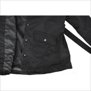 Black belted jacket from Snow Country Outerwear Women’s Rain Jacket collection