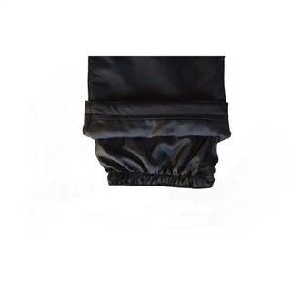 Black elastic-cuffed pant leg on Snow Country Outerwear Women’s Plus Size Ski Bibs