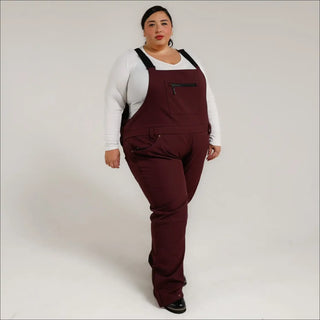 Burgundy plus size snow ski bibs with zipper pocket and stretch soft shell fabric