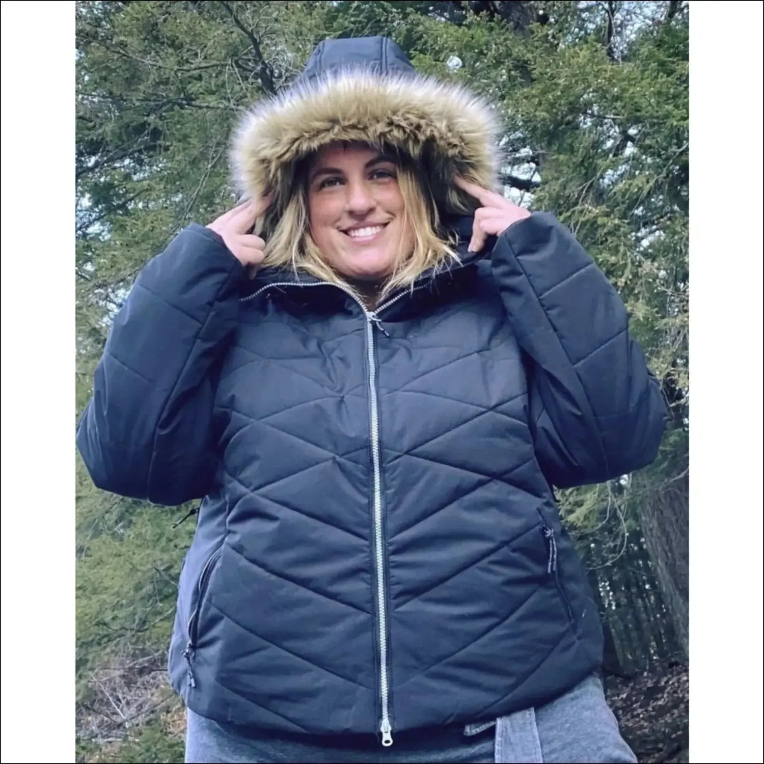Black puffer jacket with fur-trimmed hood from Snow Country Outerwear Plus Size Vail Ski Coat