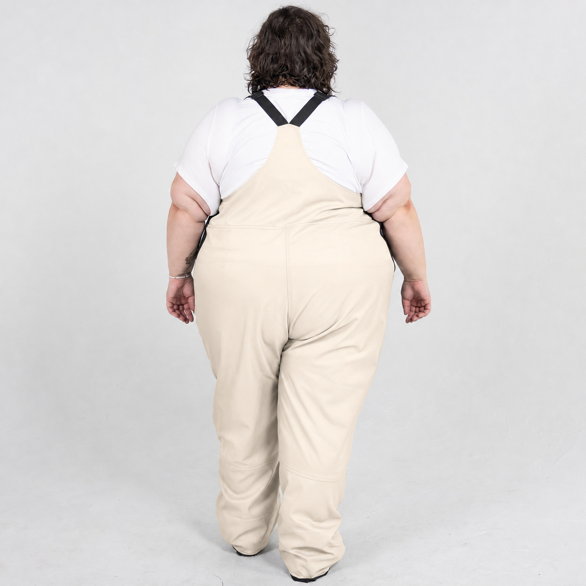 Vanilla plus size soft shell ski snow bibs, back view on model