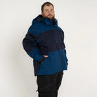 Two-tone blue hooded winter ski jacket for men in big and tall sizes showing insulation