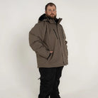 Man wearing Snow Country Outerwear Siberian III insulated winter soft shell jacket in big sizes