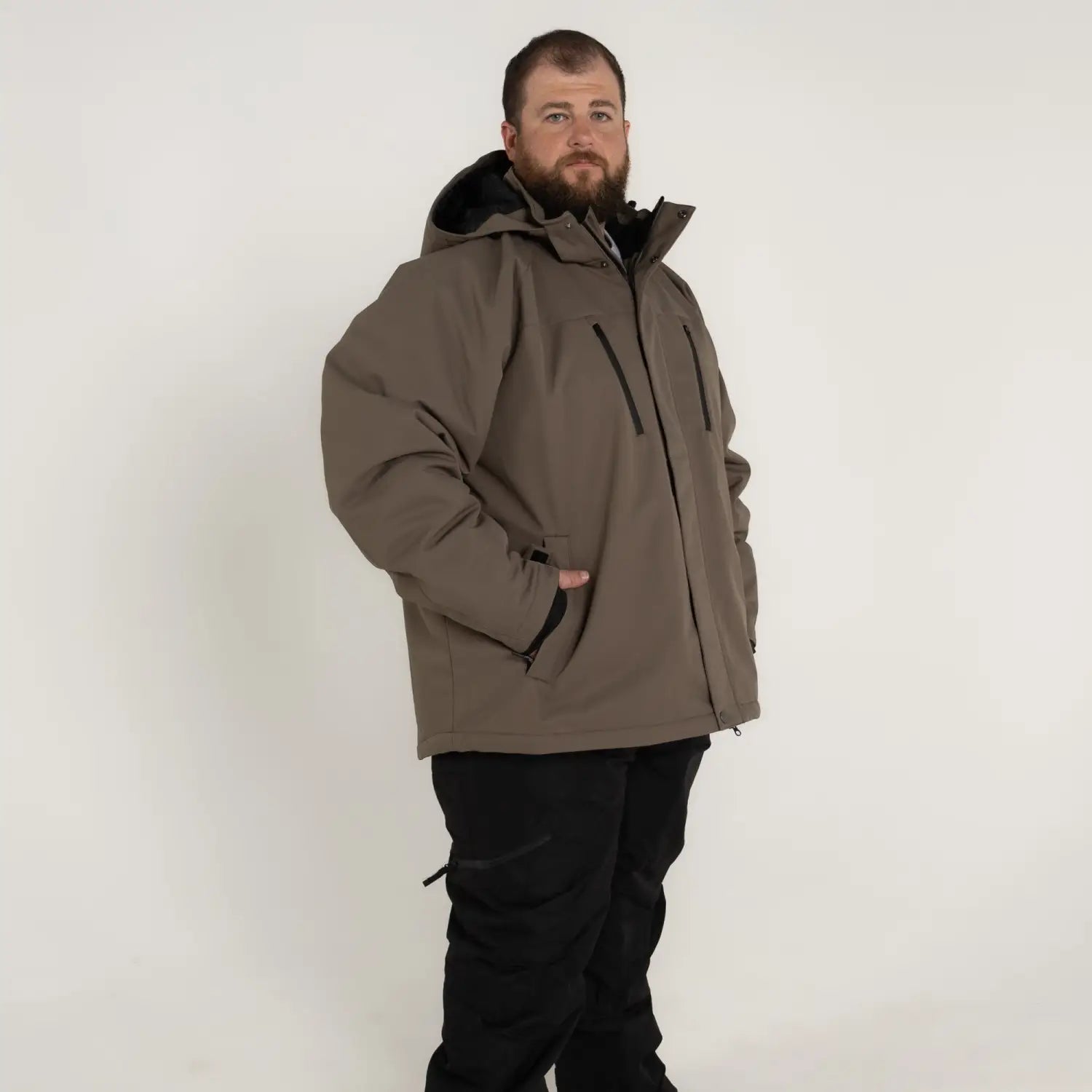 Man wearing Snow Country Outerwear Siberian III insulated winter soft shell jacket in big sizes